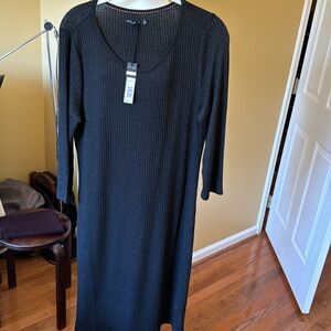 Black dress.  Textured and knit like.  Size Medium; Brand new with tags.